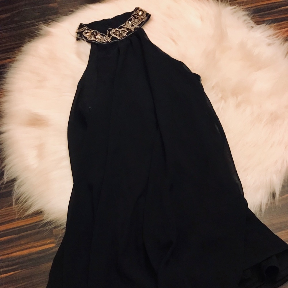 Gem stone high neckline blouse